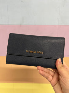 MK wallet retail